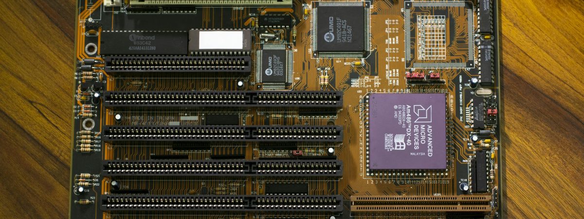 Close-up view of a vintage motherboard showcasing intricate circuitry and components.